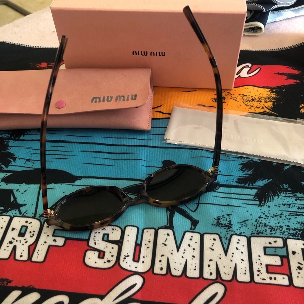 Miu Miu Tortoiseshell Oval Sunglasses - Brown Lenses